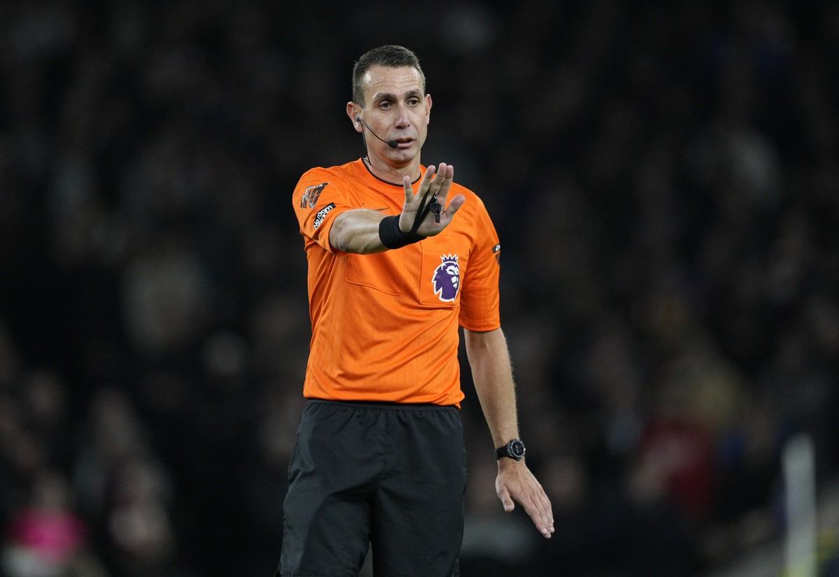FILE - Referee David Coote reacts during the English Premier League soccer match between Tottenham Hotspur and Brighton and Brentford, at White Hart Lane Stadium in London, England, Jan. 31, 2024. (AP ...