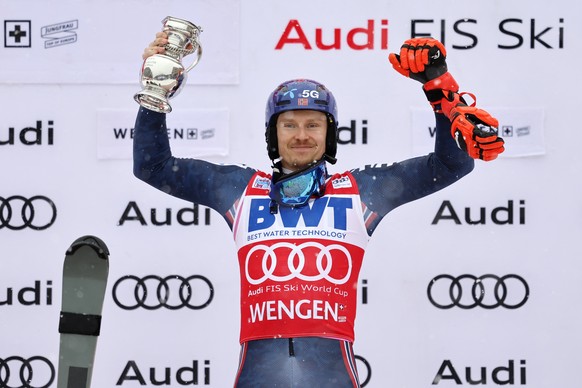 Winner Henrik Kristoffersen of Norway celebrates on the podium after the men&#039;s slalom race at the Alpine Skiing FIS Ski World Cup in Wengen, Switzerland, Sunday, January 15, 2023. (KEYSTONE/Peter ...