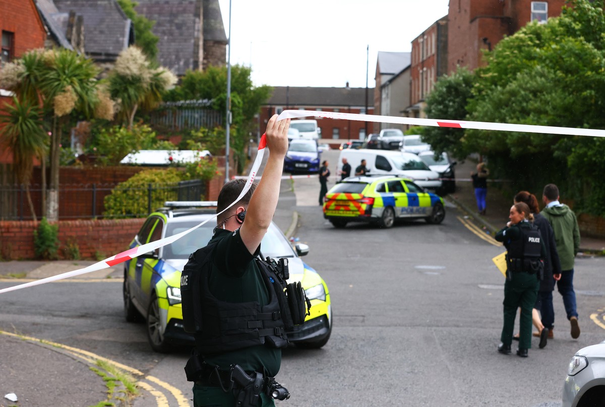 Members of the Police Service of Northern Ireland secure the area around the scene of a stabbing in North Belfast, Tuesday, June 9, 2026. (AP Photo/Peter Morrison)
Britain Northern Ireland Stabbing