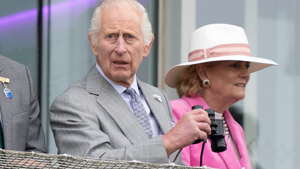 epa11382209 Britain's King Charles III watches his horse Treasure racing during Ladies Day at the Epsom Derby in Epsom Downs in Surrey, Britain, 31 May 2024. The Epsom Derby Festival of horse rac ...
