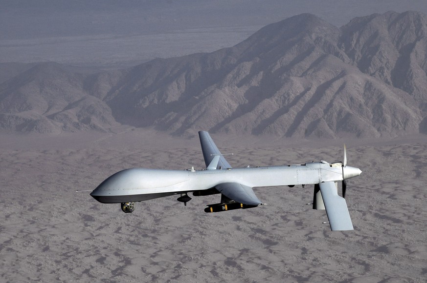 epa07659380 (FILE) - An undated handout photo made available by the US Air Force shows a MQ-1 Predator unmanned aircraft in flight at an undiclosed location, reissued 20 June 2019. Media reports on 20 ...