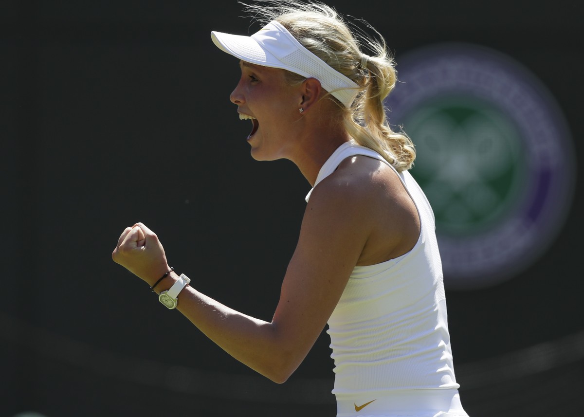 Donna Vekic of Croatia celebrates winning match point and defeating Sloane Stephens of the US in the Women's Singles first round match at the Wimbledon Tennis Championships in London, Monday July ...