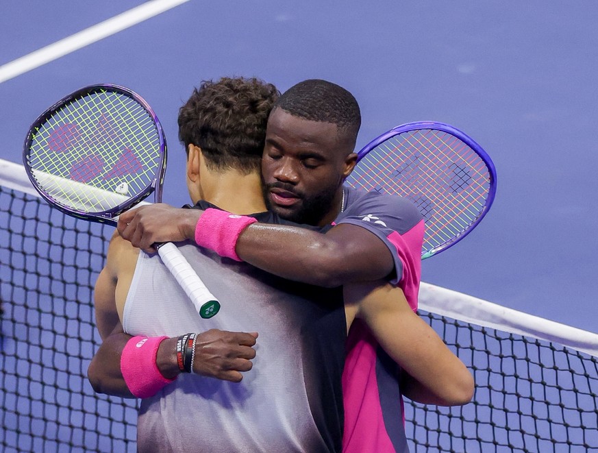 epa13233418 Ben Shelton of the US (L) greets Frances Tiafoe of the US after winning their Men's Singles semi-final match at the US Open Tennis Championships at the USTA Billie Jean King National  ...