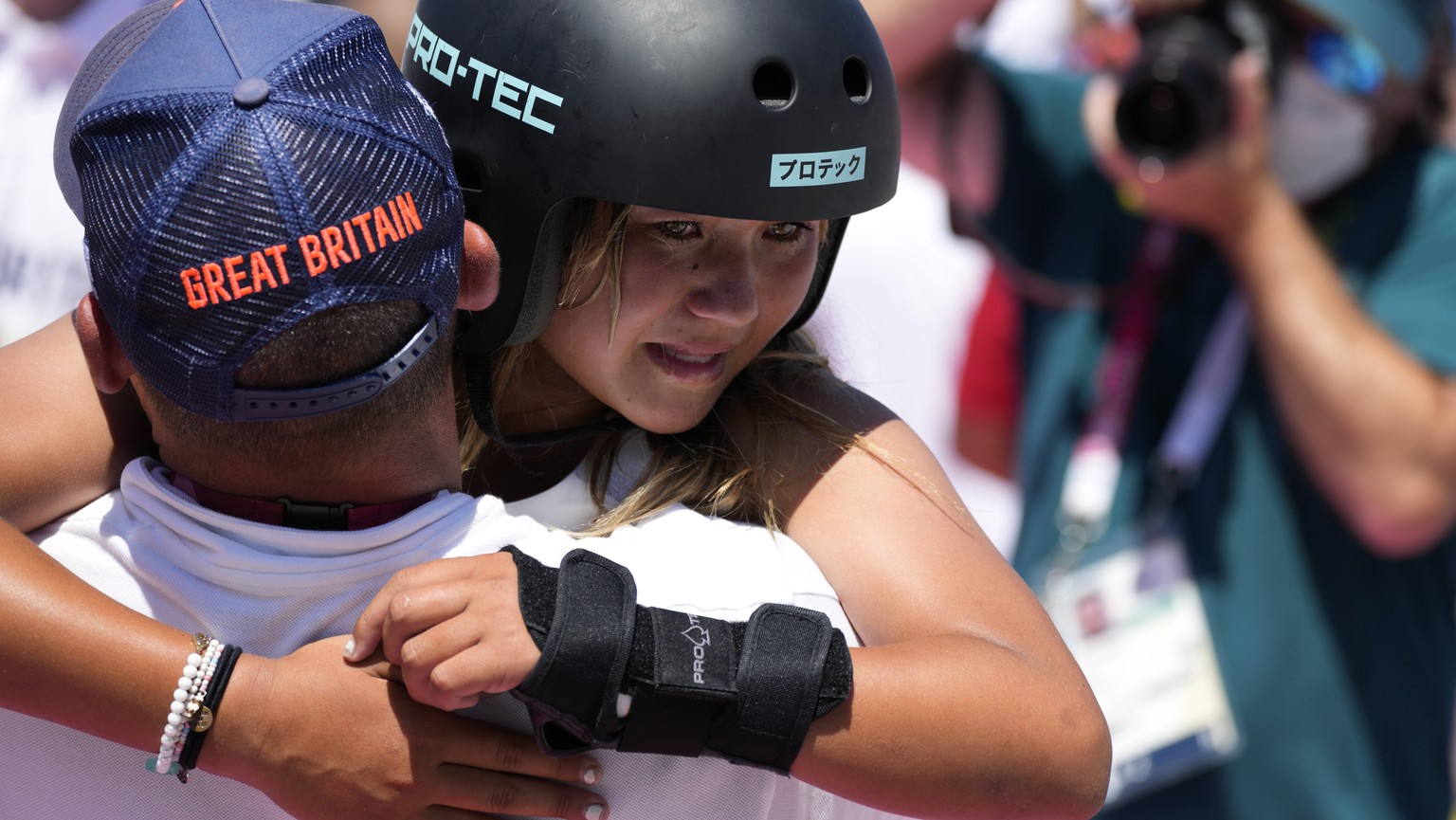 Sky Brown of Britain celebrates after winning bronze in the women&#039;s park skateboarding finals at the 2020 Summer Olympics, Wednesday, Aug. 4, 2021, in Tokyo, Japan. (AP Photo/Ben Curtis)