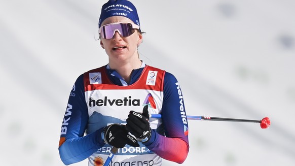 epa09056400 Nadine Faehndrich of Switzerland reacts during the Womens Cross Country 30km mass start race at the 2021 Nordic Skiing World Championships, in Oberstdorf, Germany, 06 March 2021. EPA/GIAN EHRENZELLER