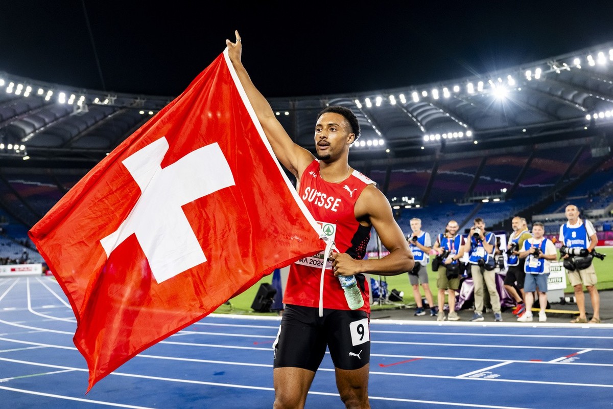 Gold medalist Timothe Mumenthaler of Switzerland celebrates during the men's 200 meters final at the European Athletics Championships, in the Olympic stadium, in Rome, Italy, Monday, June 10, 202 ...