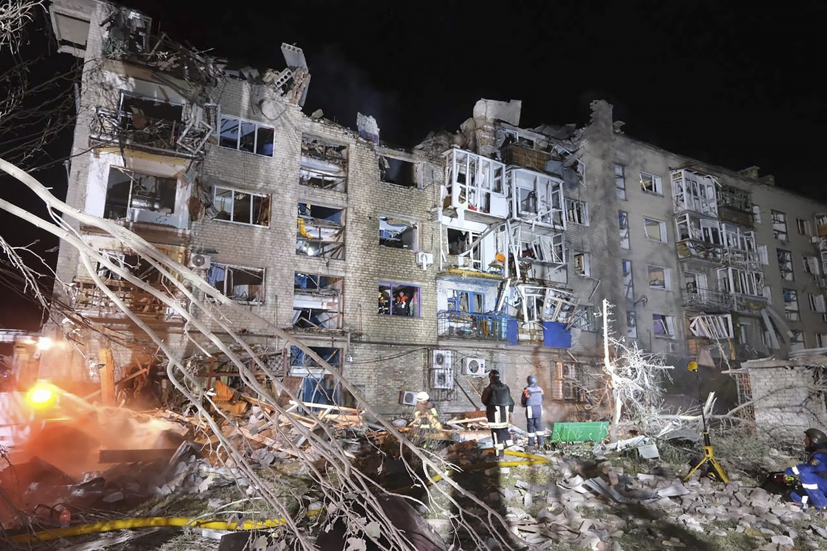 epa10790139 A handout photo made available by the National Police shows Ukrainian rescuers working at the site of a missile attack in the city of Pokrovsk, Donetsk region, eastern Ukraine, 08 August 2 ...