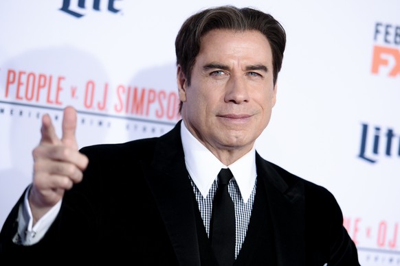 FILE - In this January 27, 2016 file photo, actor John Travolta attends the LA premiere of "American Crime Story: The People v. P. B. Simpson" held at the Westwood Village Theater in Los Angeles.  ...