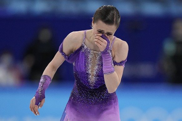 Kamila Valieva, of the Russian Olympic Committee, reacts in the women&#039;s short program during the figure skating at the 2022 Winter Olympics, Tuesday, Feb. 15, 2022, in Beijing. (AP Photo/David J. ...