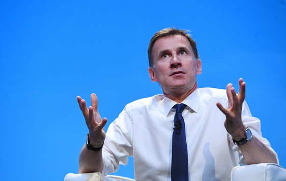 epa07666552 British Foreign Secretary Jeremy Hunt speaks to Conservative Party members at the Conservative Party leadership hustings in Birmingham, Britain, 22 June 2019. Hunt and Boris Johnson are vy ...