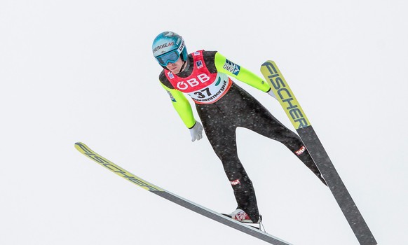 epa05103679 Michael Hayboeck of Austria competes in the second round of the Ski Flying World Championships as part of the FIS Ski Jumping World Cup in Tauplitz - Bad Mitterndorf, Austria, 15 January 2 ...