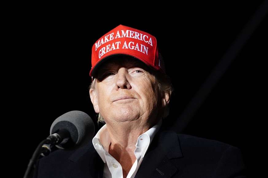 Former President Donald Trump pauses as he speaks at a rally Saturday, Jan. 15, 2022, in Florence, Ariz. (AP Photo/Ross D. Franklin)