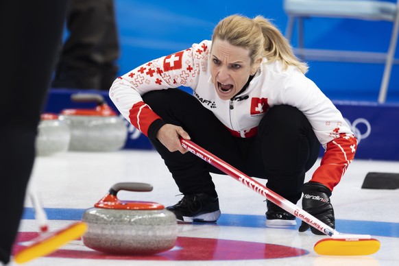 epa09744395 Switzerland skip Silvana Tirinzoni directs her teammates during the Curling Women's Round Robin Session 2 match between China and Switzerland at the Beijing 2022 Olympic Games in Beij ...