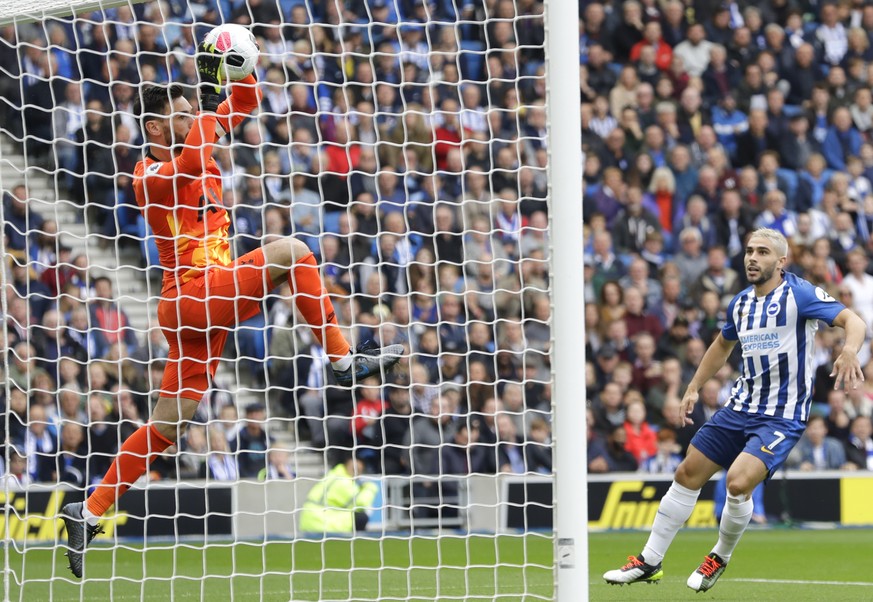 Tottenham&#039;s goalkeeper Hugo Lloris makes a save during the English Premier League soccer match between Brighton and Hove Albion and Tottenham Hotspur at Falmer stadium in Brighton, England Saturd ...