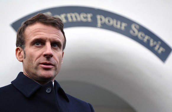epa10327651 French President Emmanuel Macron attends a press conference during a visit at the Gendarmerie school in Longvic, near Dijon France, 25 November 2022, as part of the International Day for t ...