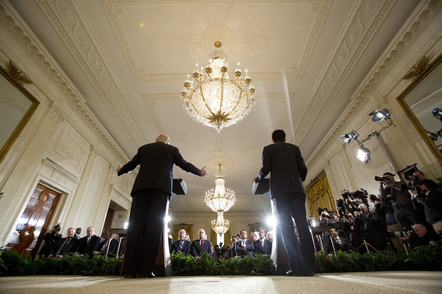 President Donald Trump and Japanese Prime Minister Shinzo Abe participate in a joint news conference in the East Room of the White House in Washington, Friday, Feb. 10, 2017. (AP Photo/Pablo Martinez  ...