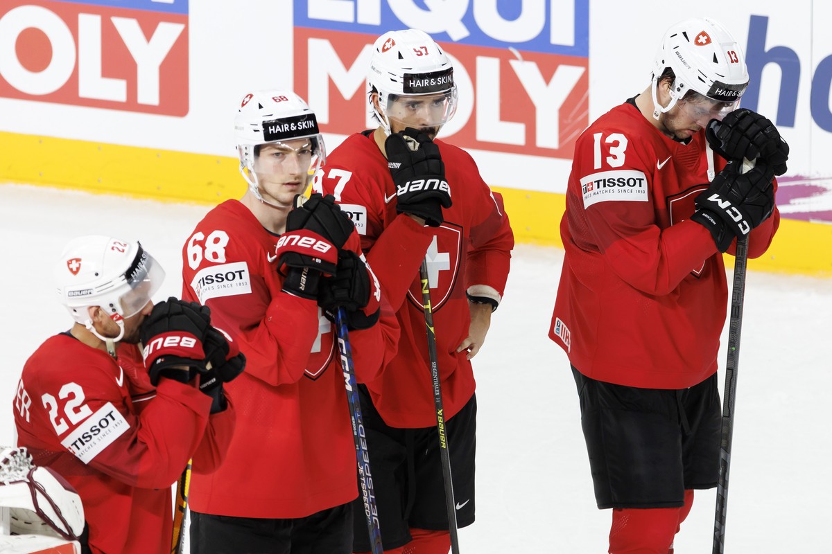 Switzerland's forward Nino Niederreiter #22, Switzerland's forward Fabrice Herzog #68 Switzerland's defender Jonas Siegenthaler #97 and Switzerland's forward Nico Hischier #13, loo ...