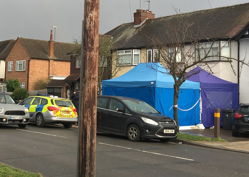 Police activity at a residential address in southwest London, Tuesday March 13, 2018. According to a police statement Tuesday they are investigating the unexplained death of a man at the address, bein ...