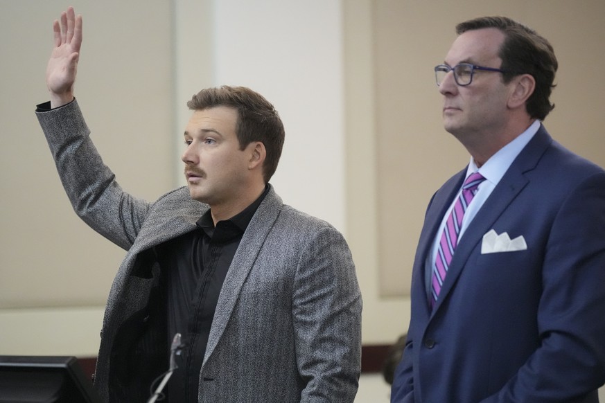 Morgan Wallen, left, pleas guilty to reckless endangerment charges related to throwing a chair off a six-story balcony in criminal court Thursday, Dec. 12, 2024, in Nashville, Tenn. (AP Photo/George W ...