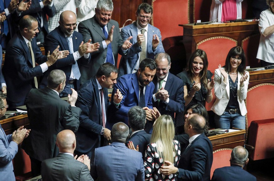 Italian Interior Minister and Deputy-Premier Matteo Salvini is applauded by lawmakers after addressing the Senate in Rome, Tuesday, Aug. 13, 2019. ItalyÄôs political leaders were scrambling to line u ...