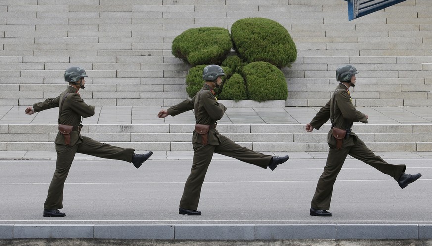 North Korean army soldiers march during a visit by Australian Defense Minister Marise Payne and Foreign Minister Julie Bishop to the border village of Panmunjom in Paju, South Korea, Thursday, Oct. 12 ...