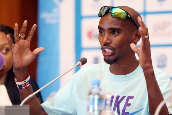 Mo Farah, a Somali-born British double Olympic champion speaks during a press conference on Thursday, May 14, 2015 in Doha, prior to the upcoming IAAF Diamond League athletics meeting. (AP Photo/Osama ...