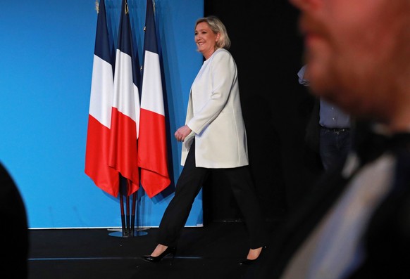 epa07603674 French far-right Rassemblement National (RN) President and member of French Parliament Marine Le Pen arrives to deliver a speech after the projections for the results of the European Parli ...