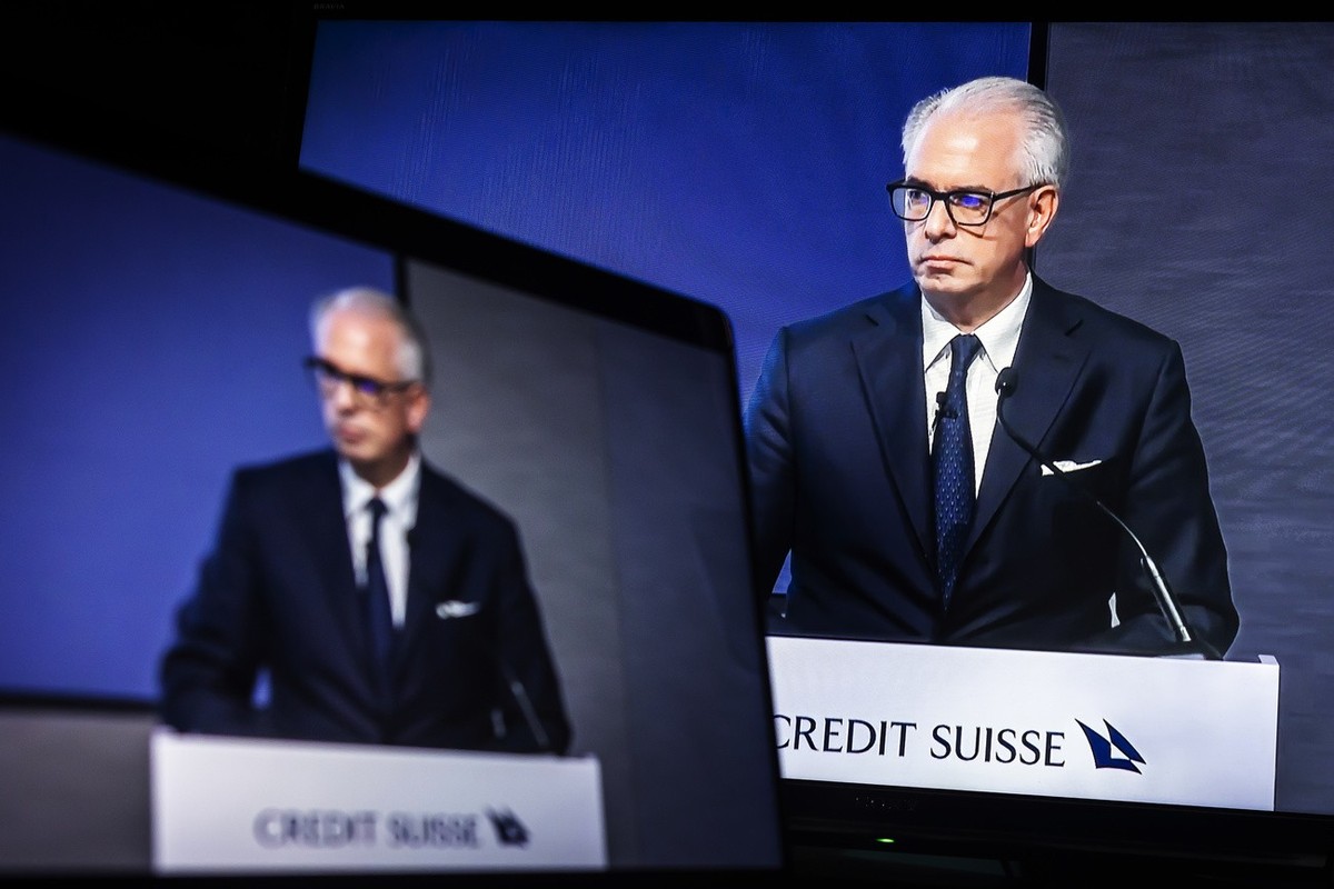 Swiss bank Credit Suisse CEO Ulrich Koerner is seen on screens presenting the quarterly report and the strategy and transformation plan for the bank taken from a webcast streaming in Zurich, Switzerla ...