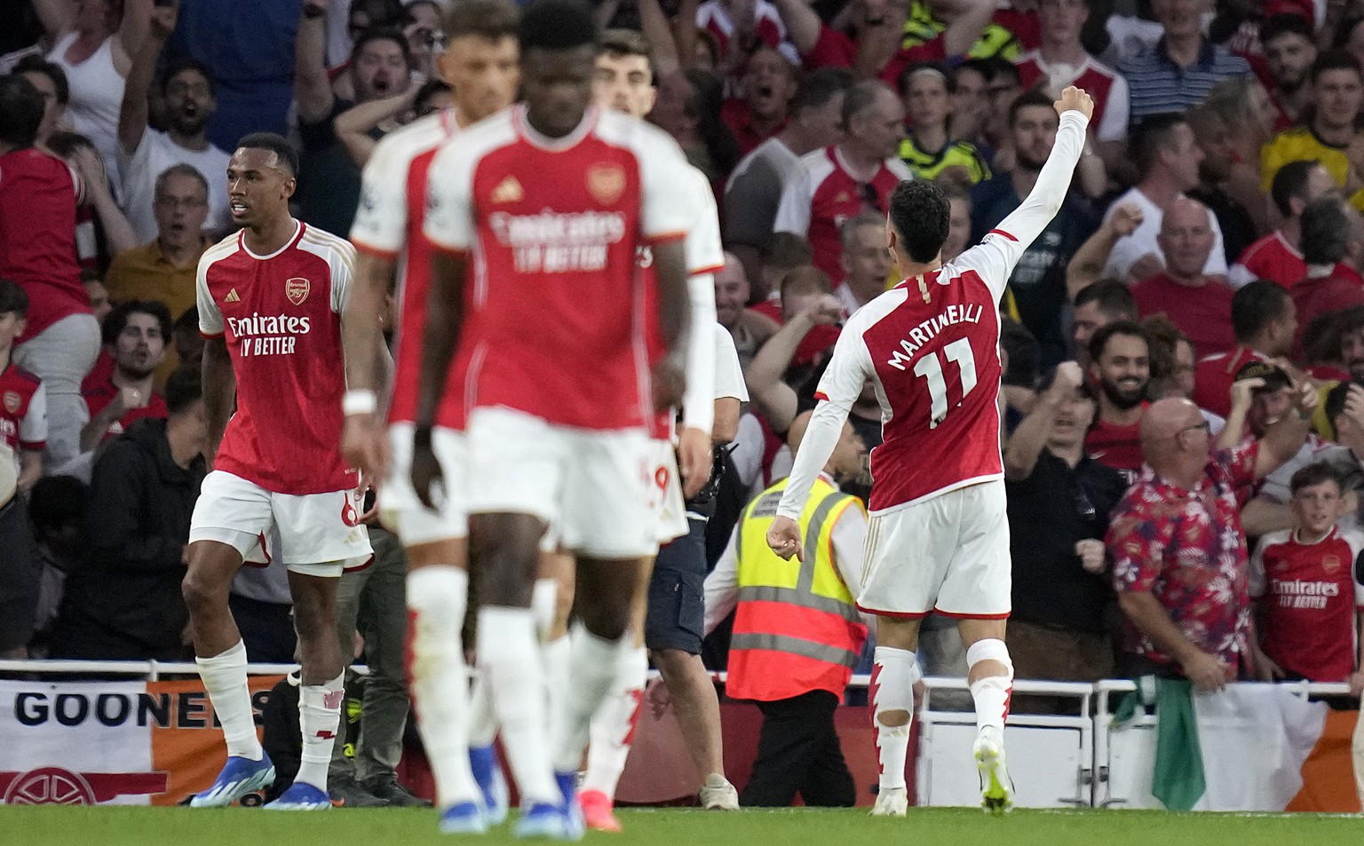 Arsenal&#039;s Gabriel Martinelli, right, celebrates scoring his side&#039;s first goal during the English Premier League soccer match between Arsenal and Manchester City at the Emirates Stadium in Lo ...