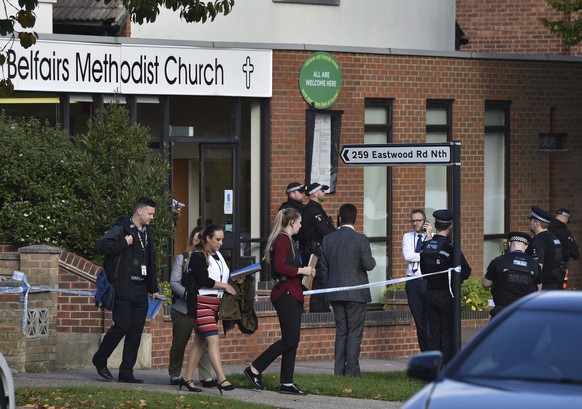 People leave the Belfairs Methodist Church in Eastwood Road North, where Conservative MP Sir David Amess has reportedly been stabbed several times at a constituency surgery, in Leigh-on-Sea, Essex, En ...