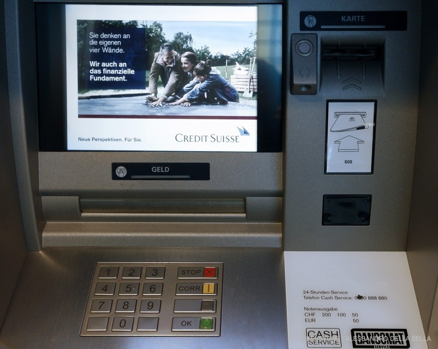 View of a cash dispenser at the Credit Suisse headquarters in Zurich, Switzerland, Tuesday, February 19, 2008. Credit Suisse Group, Switzerland's second-biggest bank, said falling credit markets  ...