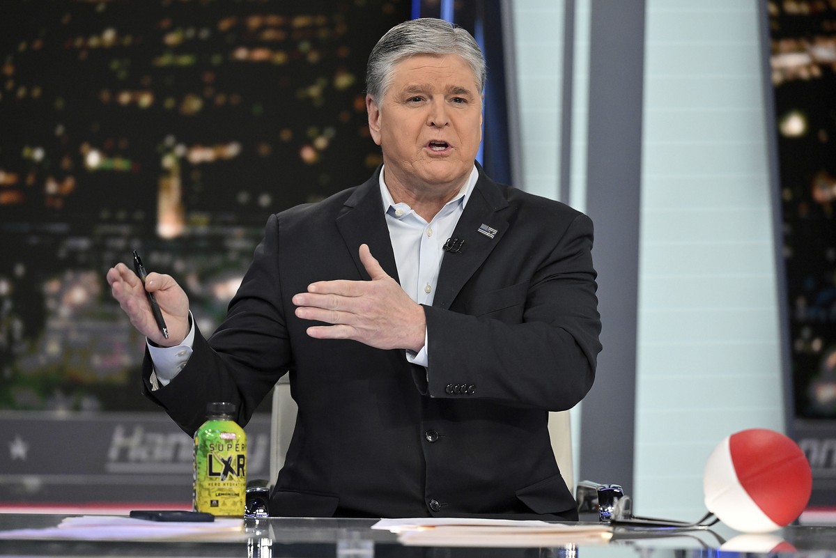 FILE- Fox News commentator Sean Hannity speaks during an interview at Fox News Studios, March 16, 2023, in New York. Dominion Voting Systems' defamation lawsuit against Fox News for airing bogus  ...