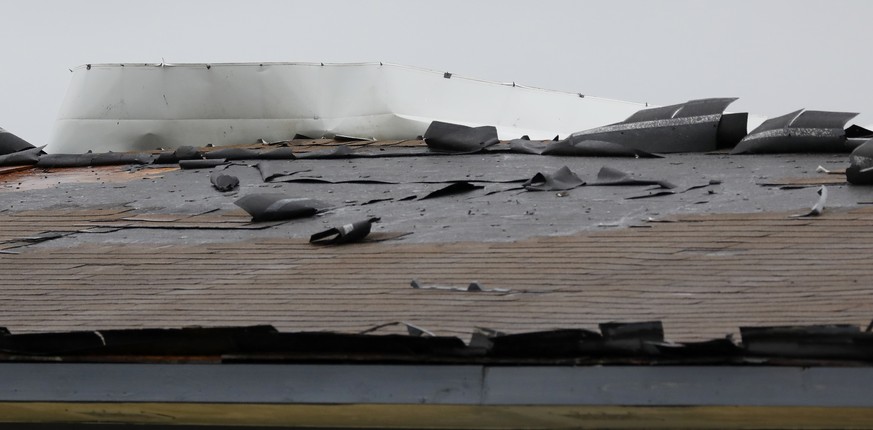 The roof of the Solar&#039;s Apartments in Morgan City, La., is damaged by the winds of Tropical Storm Barry, Saturday, July 13, 2019. Nearly all businesses in Morgan City were shuttered as coastal Lo ...