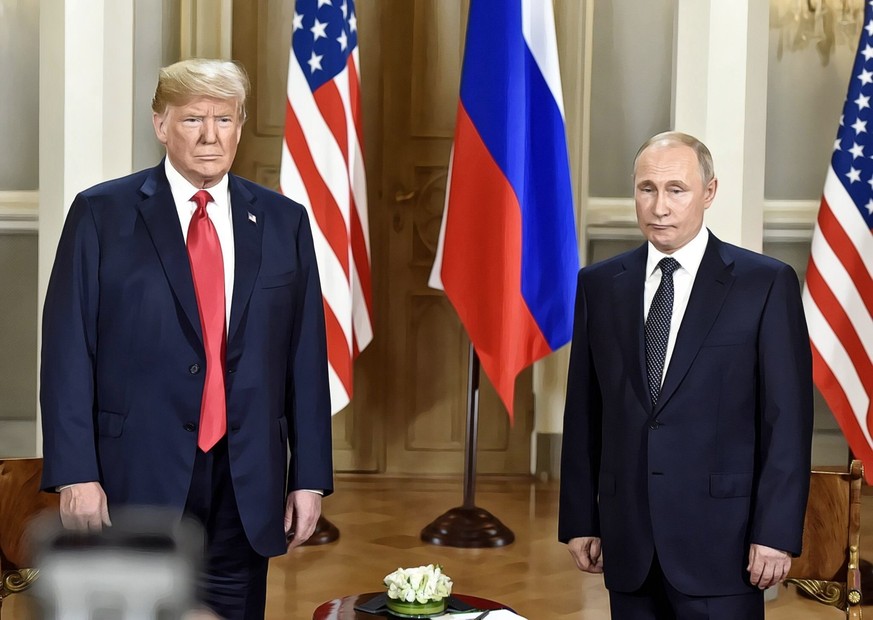 (180716) -- HELSINKI, July 16, 2018 -- U.S. President Donald Trump (L) meets with his Russian counterpart Vladimir Putin in Helsinki, Finland, on July 16, 2018. U.S. President Donald Trump and his Rus ...