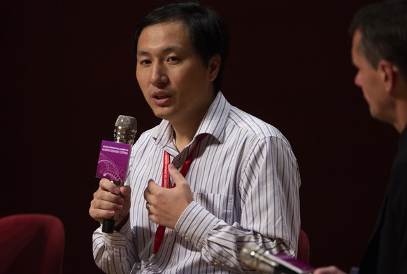 epa07194188 Mainland Chinese scientist He Jiankui defends his work during a panel discussion at the Second International Summit on Human Genome Editing, at the University of Hong Kong in Hong Kong, Ch ...