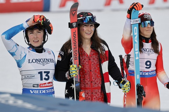 epa11888200 (L-R) Mikaela Shiffrin of the USA, Lauren Macuga of the USA and Wendy Holdener of Switzerland look on in the finish area during the Slalom race of Women's Team Combined event at the F ...