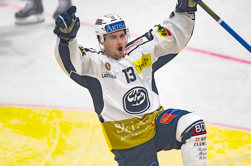 Ambri&#039;s player Marco Mueller celebrates the 0-3 goal, during the preliminary round game of National League A (NLA) Swiss Championship 2019/20 between HC Lugano and HC Ambri Piotta at the ice stad ...