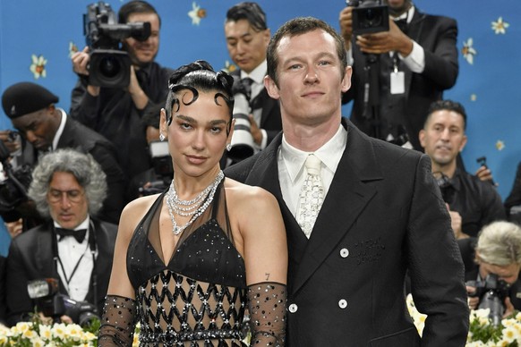 FILE - Dua Lipa, left, and Callum Turner attend The Metropolitan Museum of Art&#039;s Costume Institute benefit gala on May 5, 2025, in New York. (Photo by Evan Agostini/Invision/AP, File)
People Dua  ...