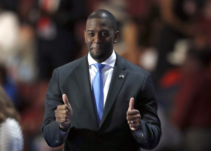 Andrew Gillum, mayor of Tallahassee, gestures as he takes the stage to speak during the third day of the Democratic National Convention in Philadelphia , Wednesday, July 27, 2016. (AP Photo/Paul Sancy ...