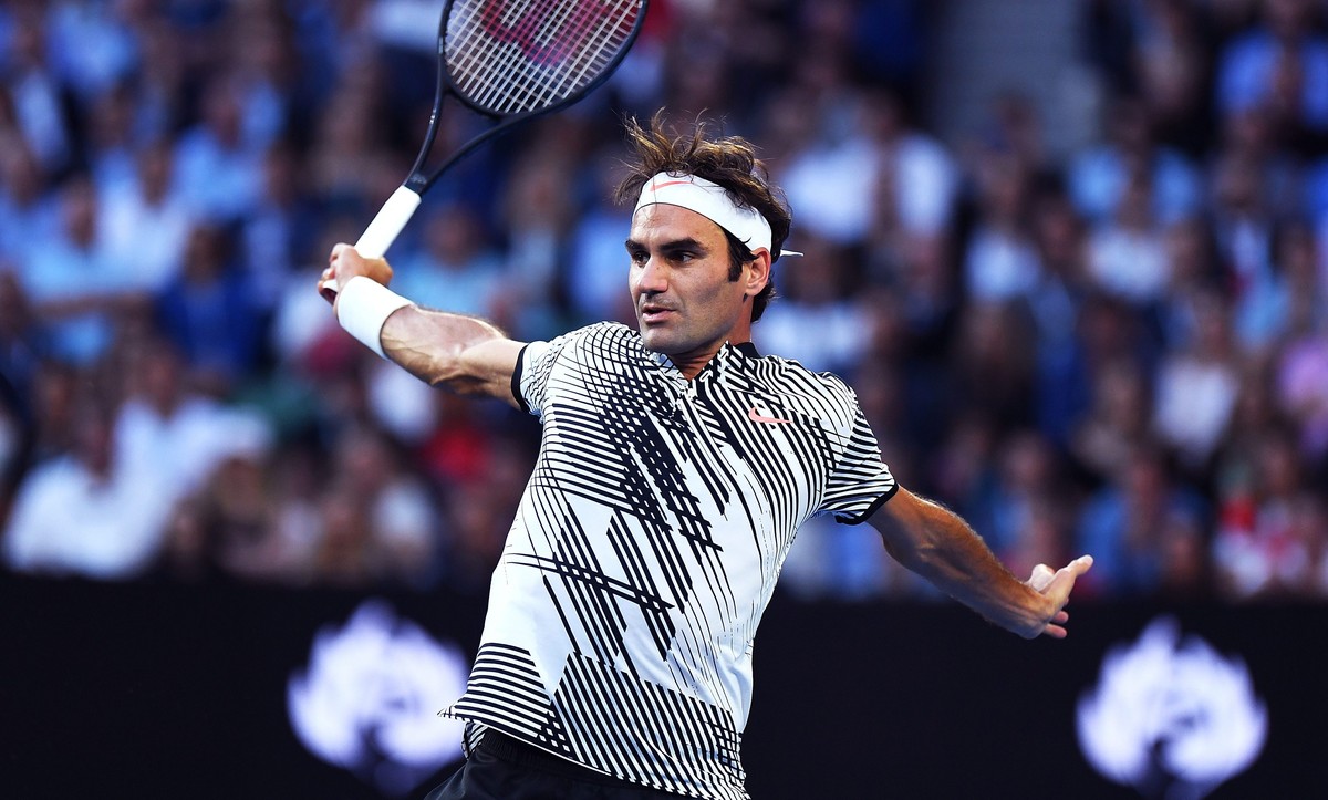 epa05746052 Roger Federer of Switzerland in action during his Men's Singles quarter-final match against Mischa Zverev of Germany at the Australian Open Grand Slam tennis tournament in Melbourne,  ...