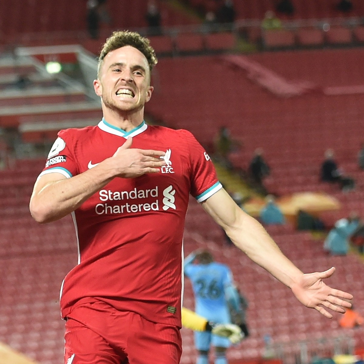 epa08789817 Liverpool's Diogo Jota celebrates after scoring the 2-1 goal during the English Premier League soccer match between Liverpool FC and West Ham United in Liverpool, Britain, 31 October  ...