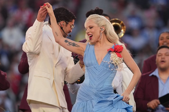 Bad Bunny and Lady Gaga perform during halftime of the NFL Super Bowl 60 football game between the New England Patriots and the Seattle Seahawks, Sunday, Feb. 8, 2026, in Santa Clara, Calif. (AP Photo ...