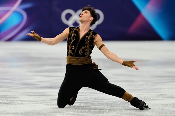 Lukas Britschgi of Switzerland competes during the men's free skate program in figure skating at the 2026 Winter Olympics, in Milan, Italy, Friday, Feb. 13, 2026. (AP Photo/Ashley Landis)
Lukas B ...