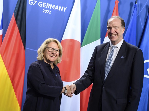 German Minister for Economic Cooperation and Development, welcomes David Malpass, President of the World Bank, to the hybrid meeting of G7 development ministers in Berlin, Germany, Wednesday, May 18,  ...