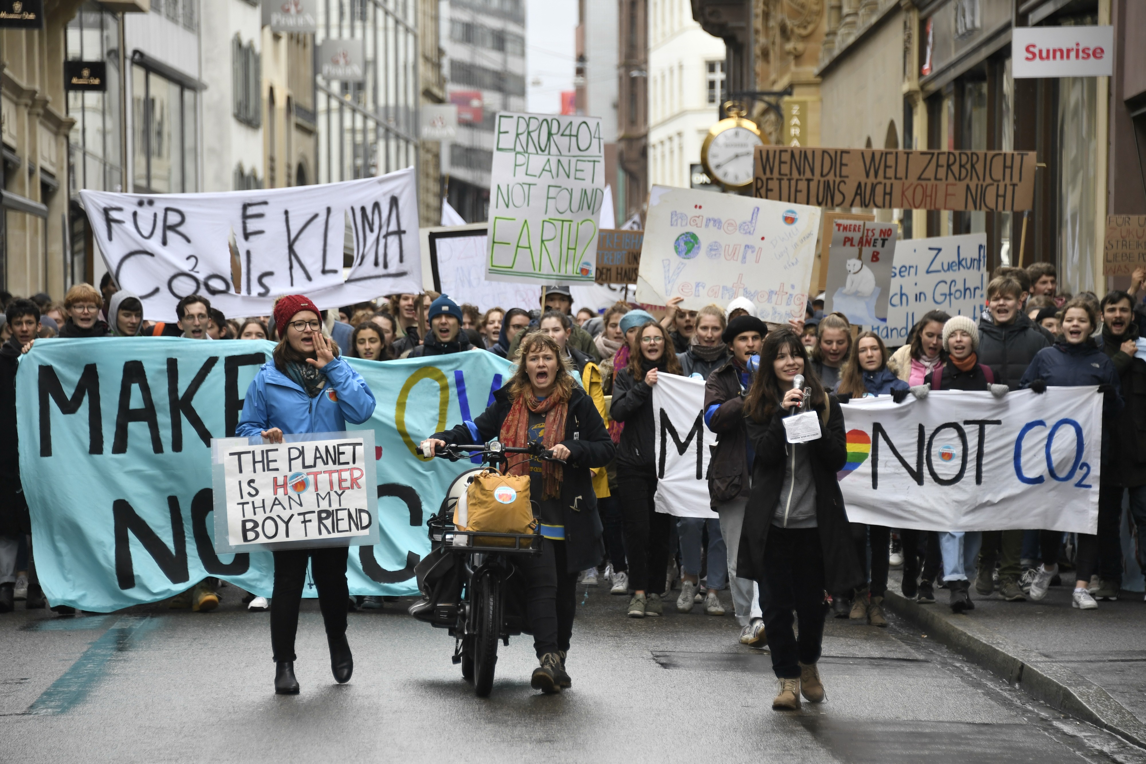 People demonstrate during a "Climate strike" demonstration to protest a lack of climate awareness, in Basel, Switzerland, Friday, March 1, 2019. (KEYSTONE/Georgios Kefalas)