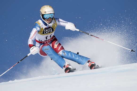 Michelle Gisin, of Switzerland, clears a pole, during the first run of the women Slalom at the 2017 FIS Alpine Skiing World Championships in St. Moritz, Switzerland, Saturday, February 18, 2017. (KEYS ...