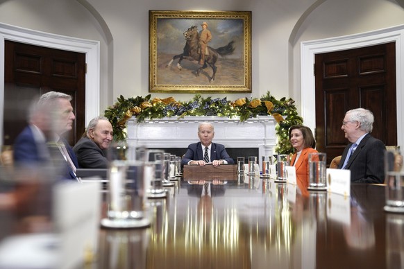 epa10336595 U.S. President Joe Biden (center) meets with Congressional leaders Kevin McCarthy (left), House Minority Leader, Senate Majority Leader Chuck Schumer (2-L), outgoing Speaker of the Senate house N...