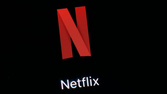 FILE- This March 19, 2018, file photo shows the Netflix app on an iPad in Baltimore. Netflix reports financial results Tuesday, April 16, 2019. (AP Photo/Patrick Semansky, File)