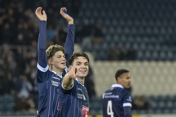 FC Lucerne celebrates with Lars Villier, center, with the goal to make it 2-1 in the Premier League championship match between FC Lucerne and Lausanne Sport on Sunday, January 28, 2024 in Lucerne.  (Keystone/Urs Flow...