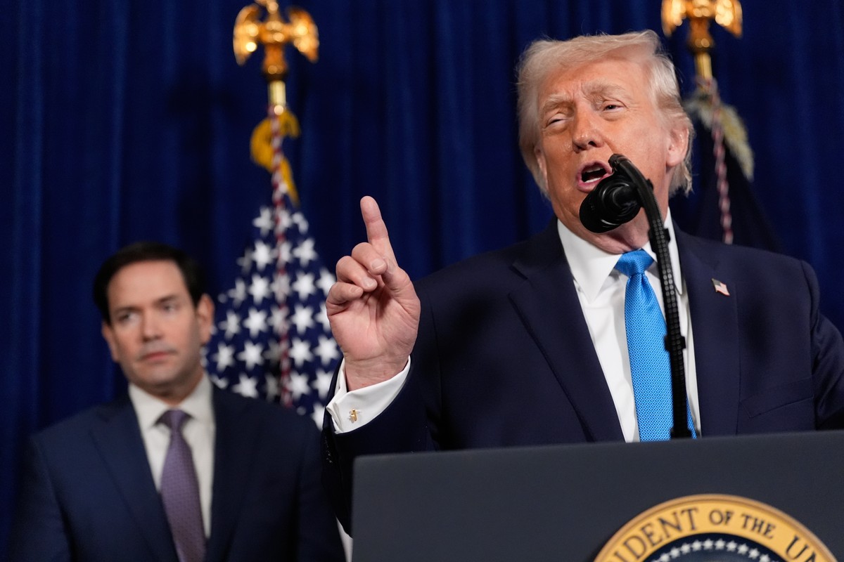 President Donald Trump speaks during a news conference at Mar-a-Lago, Saturday, Jan. 3, 2026, in Palm Beach, Fla., as Secretary of State Marco Rubio listens. (AP Photo/Alex Brandon)
Donald Trump